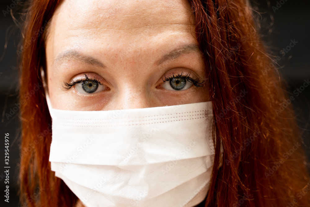 close up portrait of a girl wearing a face mask against coronavirus close up portrait of a girl wearing a face mask against coronavirus