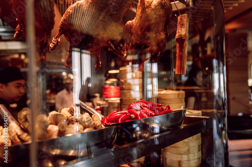 Canvas Print Showcase of a Chinese street restaurant with traditional Chinese food and produc