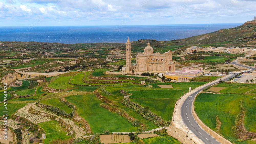 Aerial view over Basilica Ta Pinu in Gozo - a national shrine - aerial photography