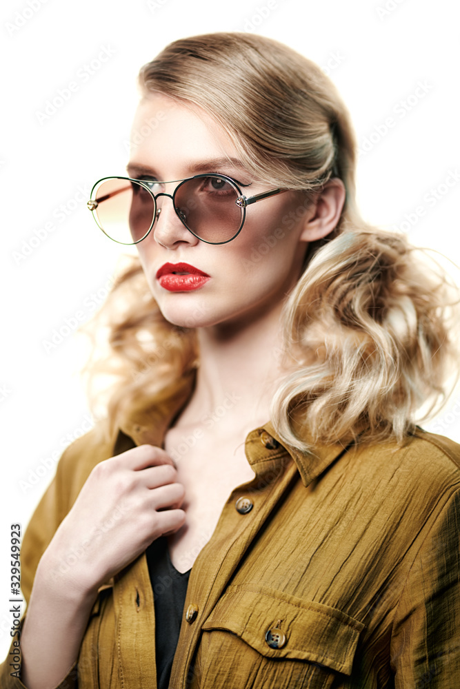 young woman in modern sunglasses