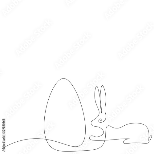 Easter bunny with egg silhouette vector illustration © Keya
