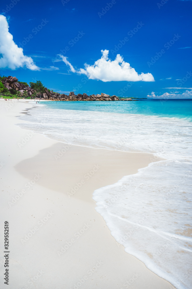 Grand Anse sandy beach at La Digue island, Seychelles. Holiday vacation travel destination concept Grand Anse sandy beach at La Digue island, Seychelles. Holiday vacation travel destination concept