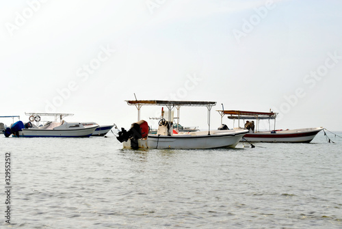 Fishermen local boats in the sunny day, Manama, Bahrain