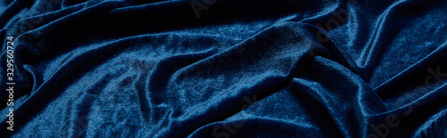 Cuadro en lienzo close up view of blue soft and crumpled velour textured cloth, panoramic shot