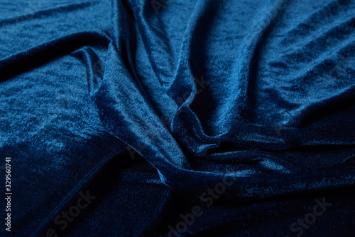 Konstfotografi close up view of blue soft and crumpled velour textured cloth