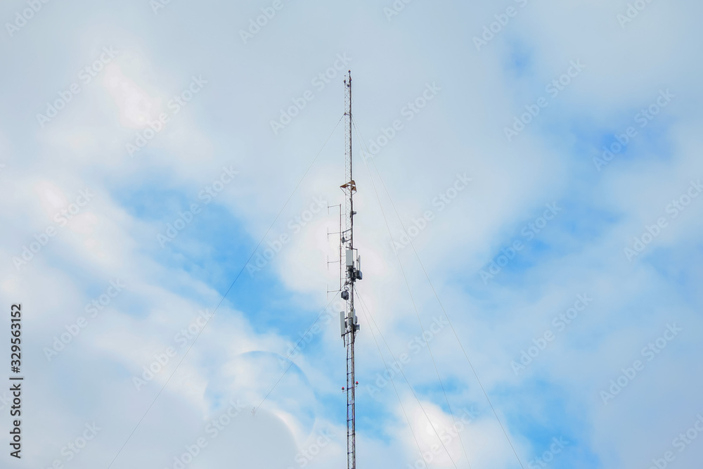 Kostomuksha, Karelia, Russia.There's a cell tower and blue sky.March, 10.2020. Kostomuksha, Karelia, Russia.There's a cell tower and blue sky.March, 10.2020.