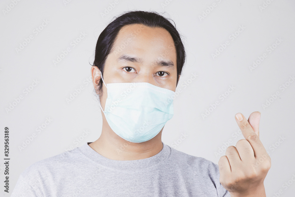 men wear face masks to protect against the covid-19 virus men wear face masks to protect against the covid-19 virus