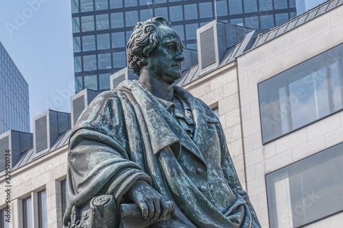 Bronze statue of poet Johann Wolfgang von Goethe at the Goetheplatz in Frankfurt am Main, Germany. Monument created in 1844. photo