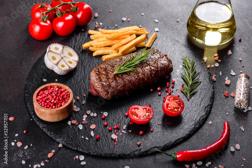 Ribeye steak with potatoes, onions and cherry tomatoes