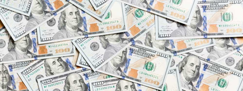 Top view of American money background. Pile of dollar cash. Paper banknotes concept