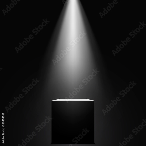 Black cube with spotlight. Podium. Pedestal.