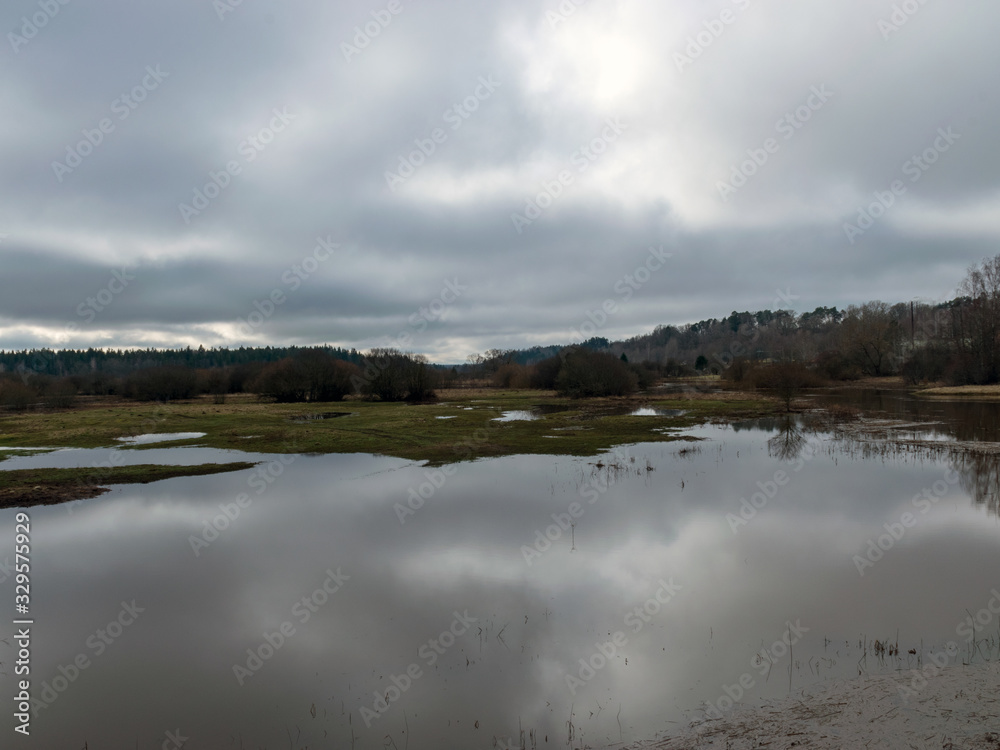 Fototapeta premium landscape with flooded river in spring