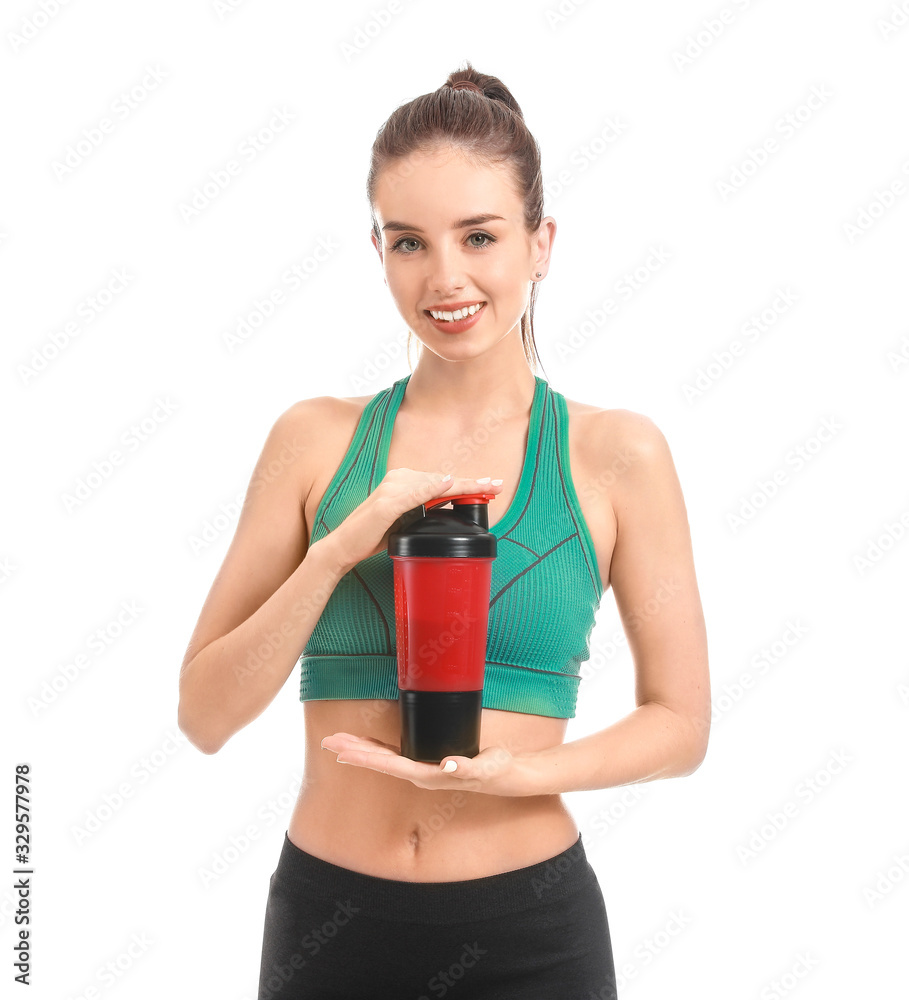 Sporty young woman with protein shake on white background Sporty young woman with protein shake on white background