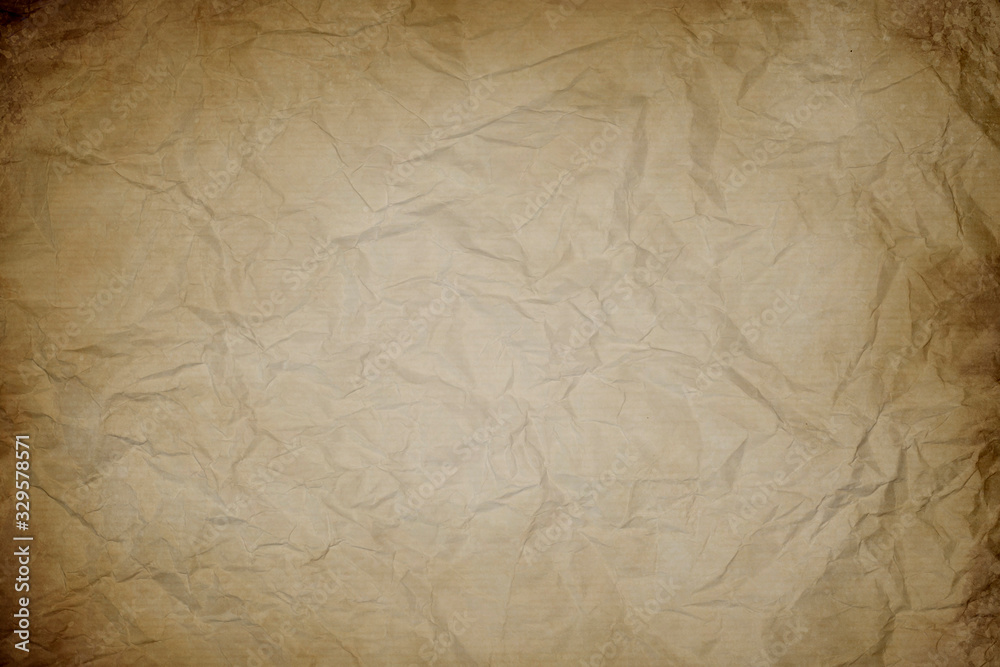 old wrinkled paper texture or background with dark borders
