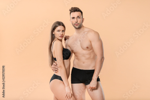 Young couple in underwear o...