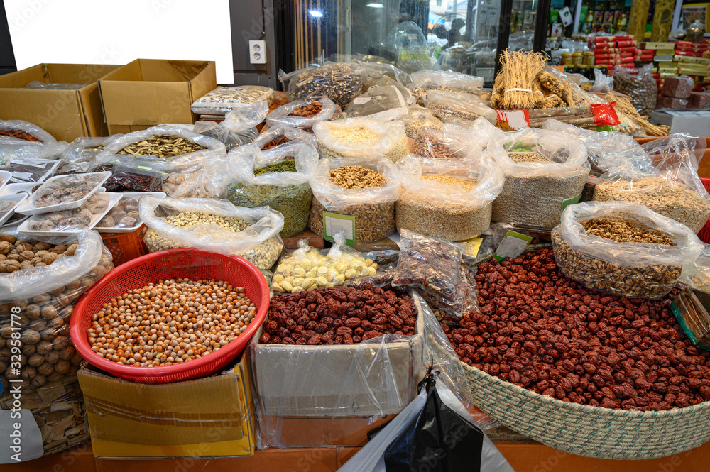 Fototapeta premium Grocery stall with raw materials from plants and herbs for ingredient food