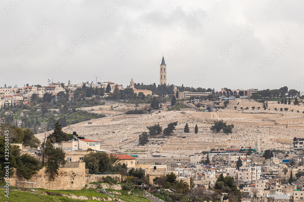 View of the old city of Jerusalem, jewish cemetery and the The Russian Church on Mount Eleon from the Abu Tor district of Jerusalem city in Israel