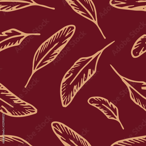 Seamless pattern with yellow outline of bird feathers. Hand drawn vector illustration on a red background. Duplicate feathers in a dissimilarity.