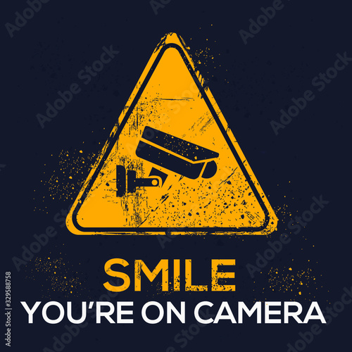  Warning sign (Smile you’re on camera), vector illustration.
