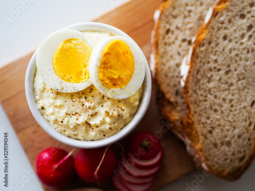 Easter egg spread with bread and raddish