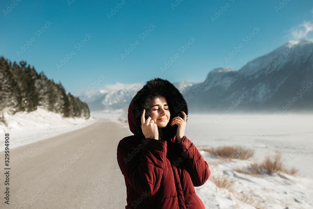 portrait of young European Muslim woman with hijab have fun at beautiful sunny winter day. portrait of young European Muslim woman with hijab have fun at beautiful sunny winter day.
