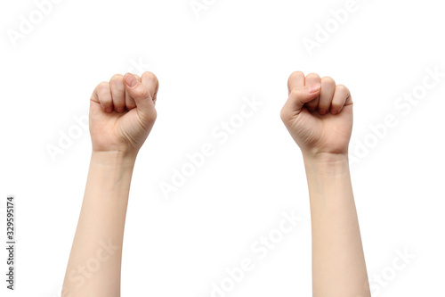 Hands on a white background. Hands clenched into a fist.