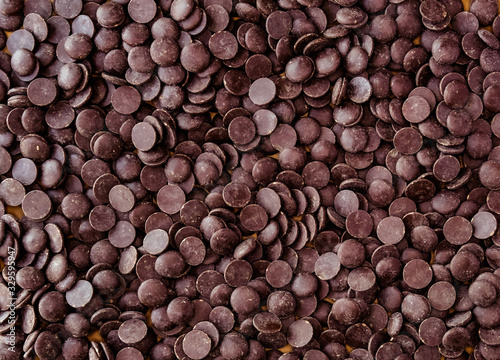 Dark chocolate couverture. photo