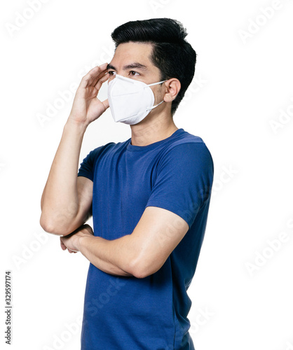 Stressful COVID-19 Coronavirus portrait handsome young asian man wearing mask protection from covid 19 isolated on white background in studio. Asian man people. COVID-19 concept.