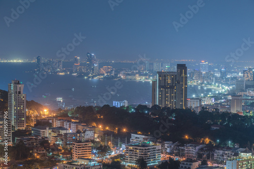 Pattaya City and Sea with suset, Thailand. Pattaya city skyline and pier at suset in Pattaya Chonburi Thailand