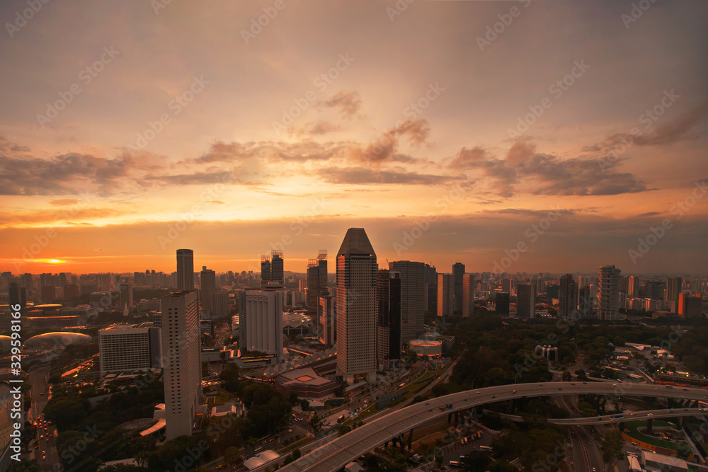 Singapore skyline aerial view, city skyscrapers at sunset, modern architecture, office buildings