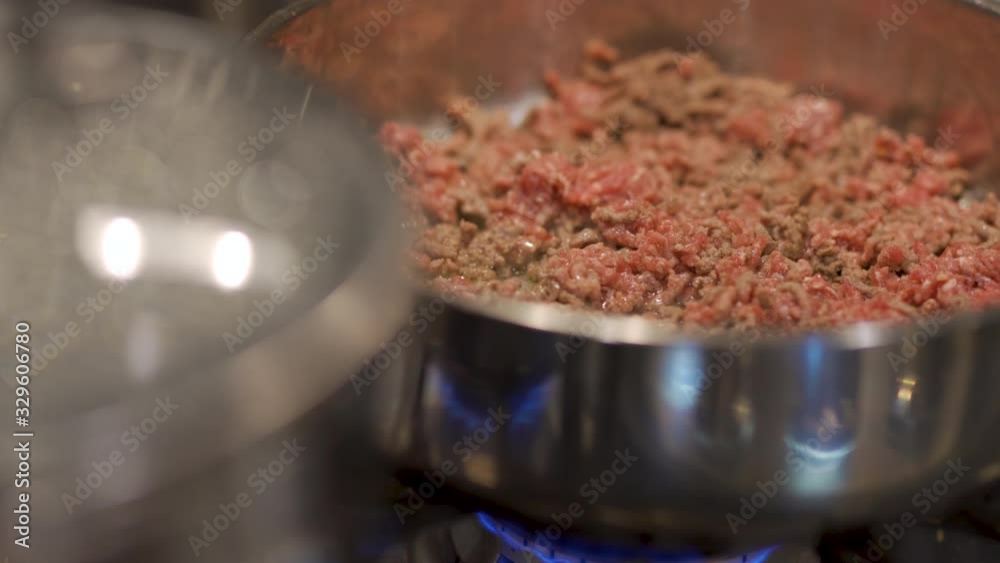Cooking Ground Beef Stove Close Up. a close up view of ground beef