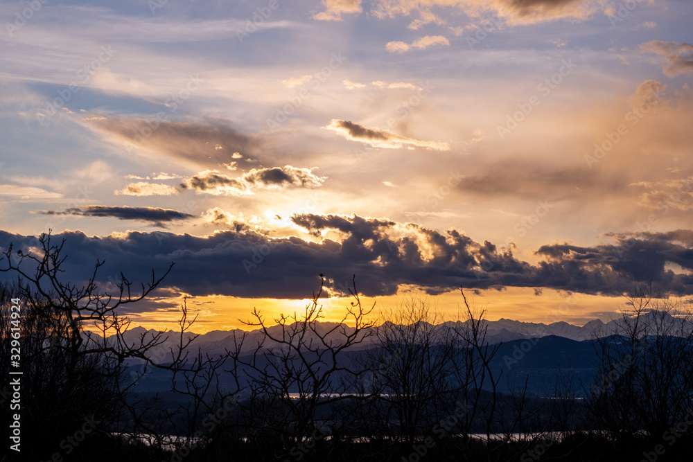 Beautiful sunset on the italian mountains in the Varese region.