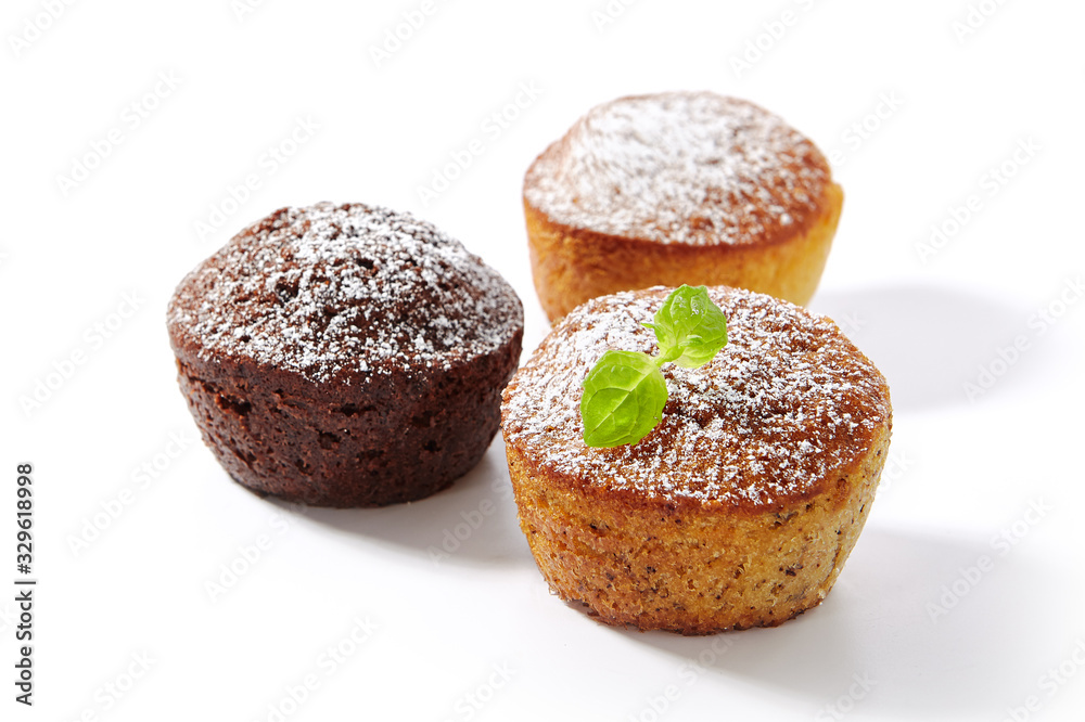Chocolate Cupcake, Vanilla Muffin and Orange Cake Isolated Chocolate Cupcake, Vanilla Muffin and Orange Cake Isolated