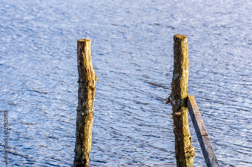 old wooden fence on the beach