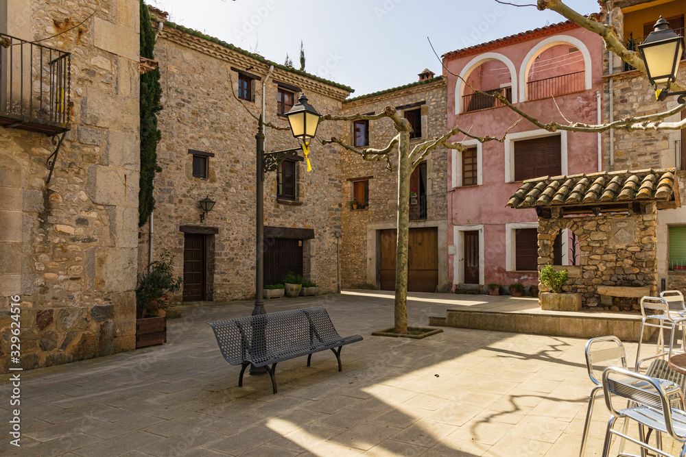 View of one of the small squares of the historic center of St Llorenzo of La Muga