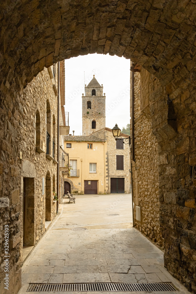 View of the bell tower of the church of St Lorenzo of Muga, from the access door to the walled nucleus.