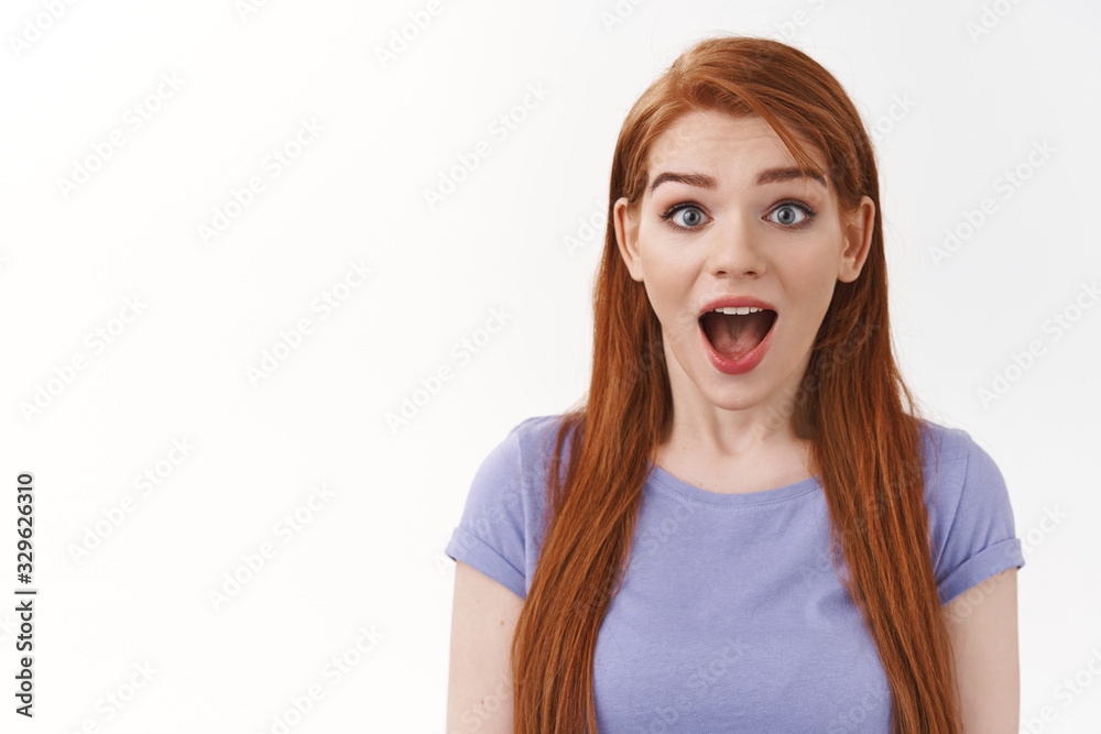 Omg look at that price. Amazed and impressed, fascinated cute redhead millennial girl, drop jaw from astonishment, see favorite band come in her town, gasping wondered, stand white background Omg look at that price. Amazed and impressed, fascinated cute redhead millennial girl, drop jaw from astonishment, see favorite band come in her town, gasping wondered, stand white background