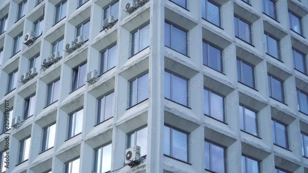 Corner of a Soviet administrative building with perfect square Windows ...