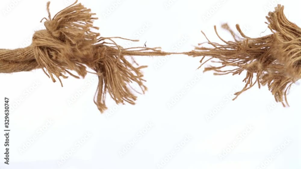 Tearing strong Rope isolated on white Background - Stress Concept