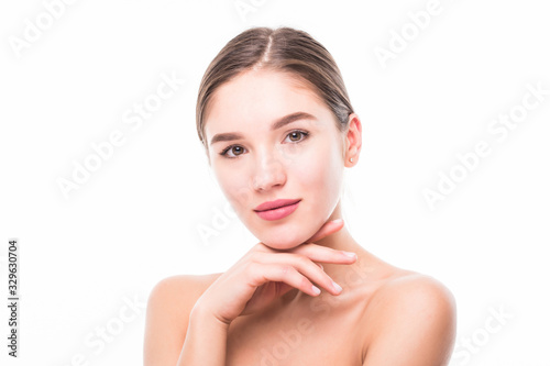 Pretty face of beautiful smiling woman posing at studio isolated on white background