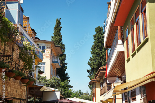 Fototapeta view of the picturesque houses on the street in Antalya.