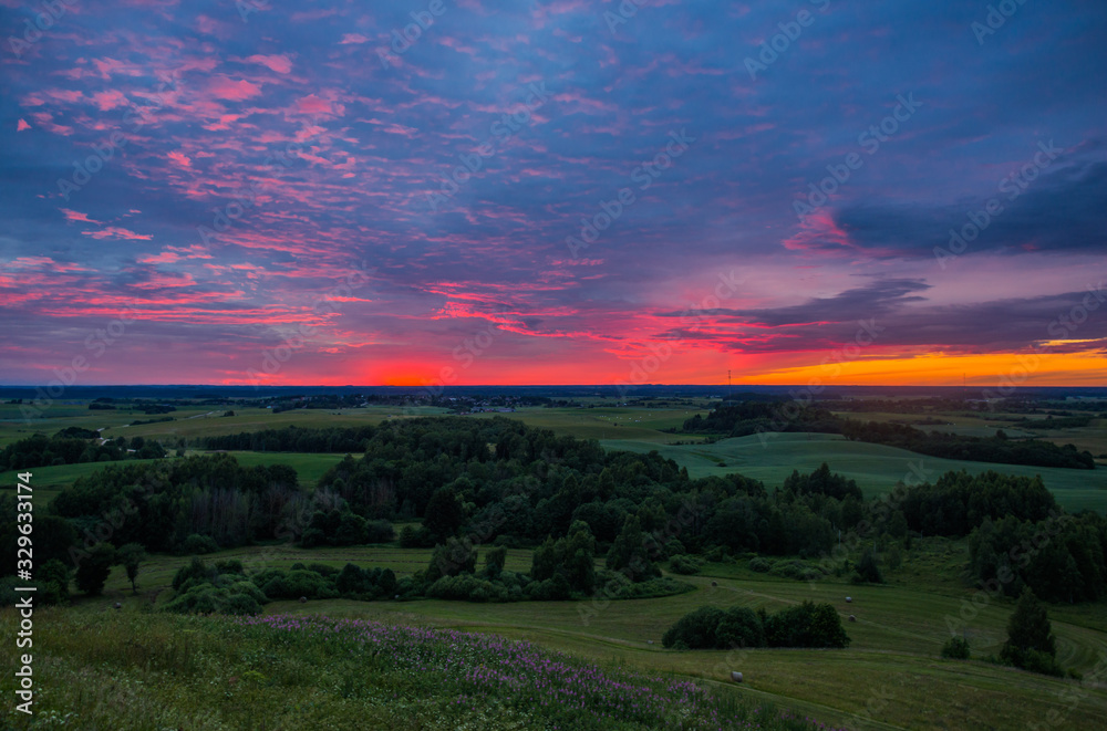 Beautiful summer sunset view from Satrija castle mound in Lithuania