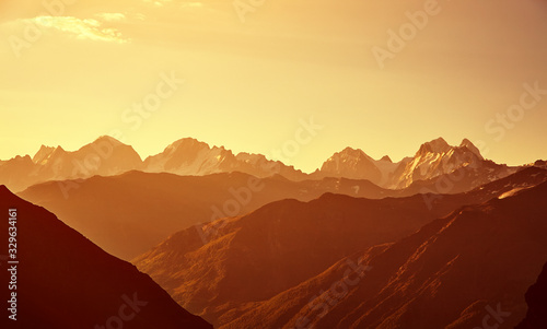 scenic alpine summer landscape at dawn. natural mountain sunrise background.