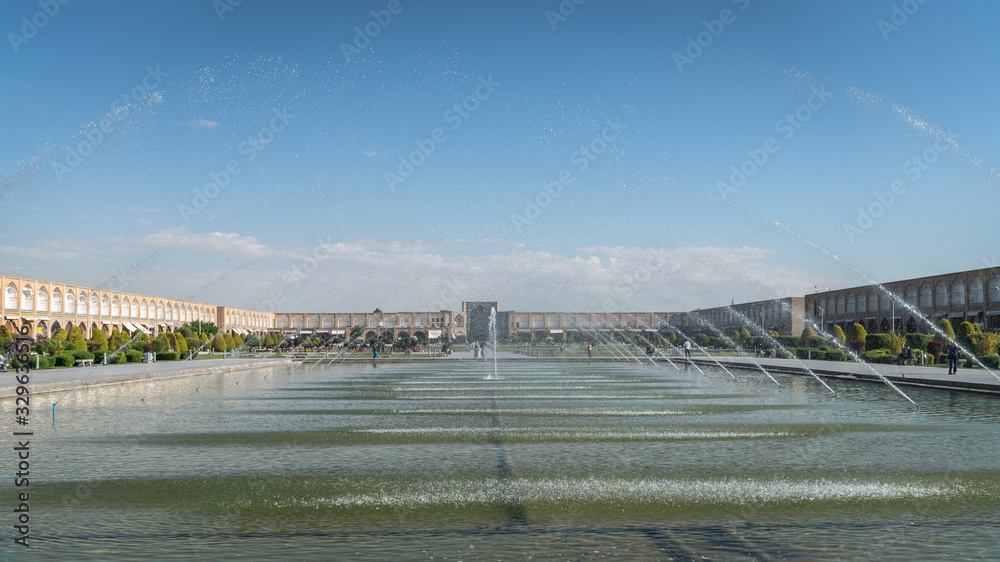Fountains and pond in Isfahan Naqsh-e Jahan Square also called Imam Square, Isfahan, Iran Fountains and pond in Isfahan Naqsh-e Jahan Square also called Imam Square, Isfahan, Iran
