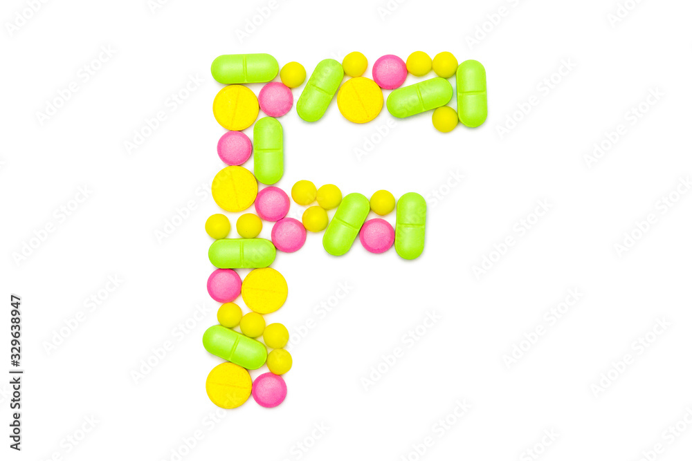 Alphabet of tablets and pills isolated on white Alphabet of tablets and pills isolated on white