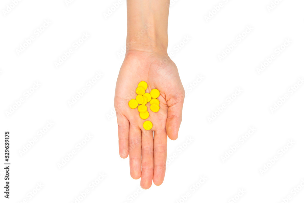 ndful of tablets and pills in hand isolated on white ndful of tablets and pills in hand isolated on white