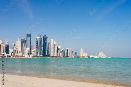 View of city center with skyscrapers from the Beach in Doha, Qatar 