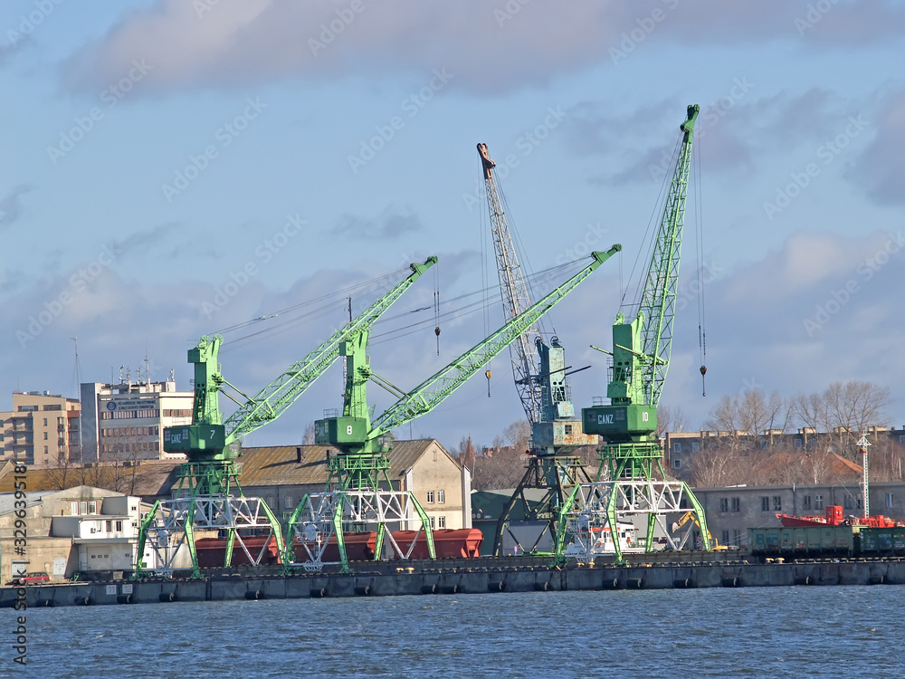 KLAIPEDA, LITHUANIA. Gantry cargo cranes in the seaport