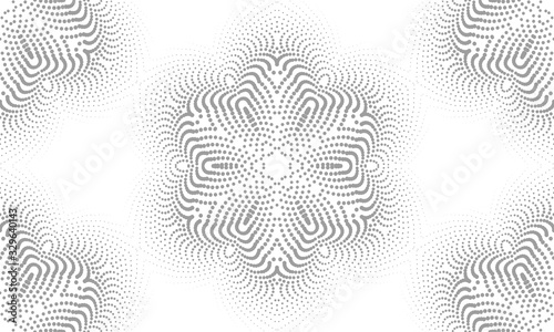 Abstract pattern of many dots on a white background.