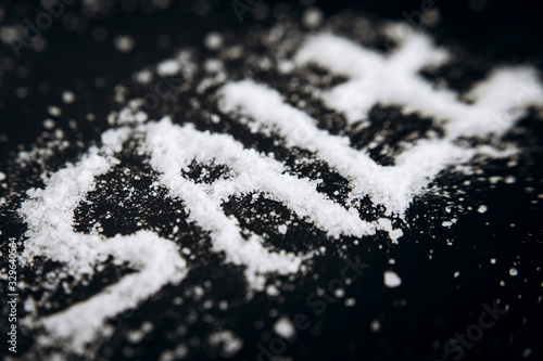 Salt crystals on black background